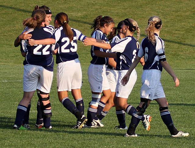 Varsity soccer girls celebrate after a goal was scored against Battle Creek Lakeview. The Lady Knights finished their 2012 season 6-8-2.
Photo by Julie DeLuca 