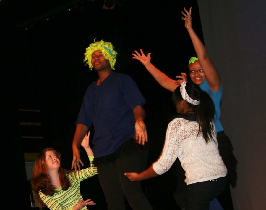 Photo by Marcus Boyd
sophomore Melanie Michelle, senior Tyrell Wilks-Williams, senior Raven Vanderbuilt, and sophomore Maryam Muhammad practicing there skit for there drama 2 performance. Tyrell is bring out his inner Nicki Minaj.