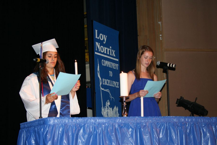 Photo by: Asia Davis
2012 class president, Marta Grabowski, gives a speech before passing down the torch to the 2013 junior class president, Sarah Townsend.  This year, current senior class president, Ciara Krimmel, will pass the torch down to the juniors.