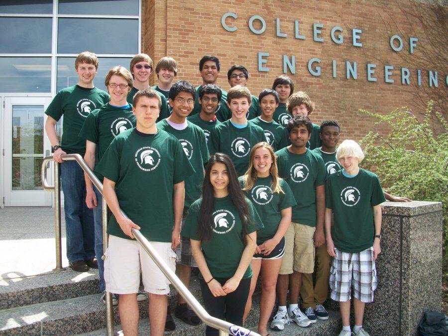 CS team members pose at the Michigan State University competition. Back row: Steven Vorbrich, first from left; Ben Dunham, third from left. Second to last row: Nick Gaunt, first from left.