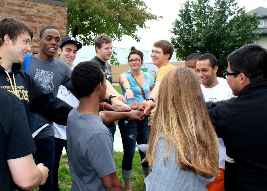 Photo credit / Allie Creamer
FOCUS members Tinashe Chaponda, Ari Solomon, Chris Miller, Jazmine Ray, Brian Bartley and others get together for a team chant after the Bronson 5k Walk/Run on September 29th. 