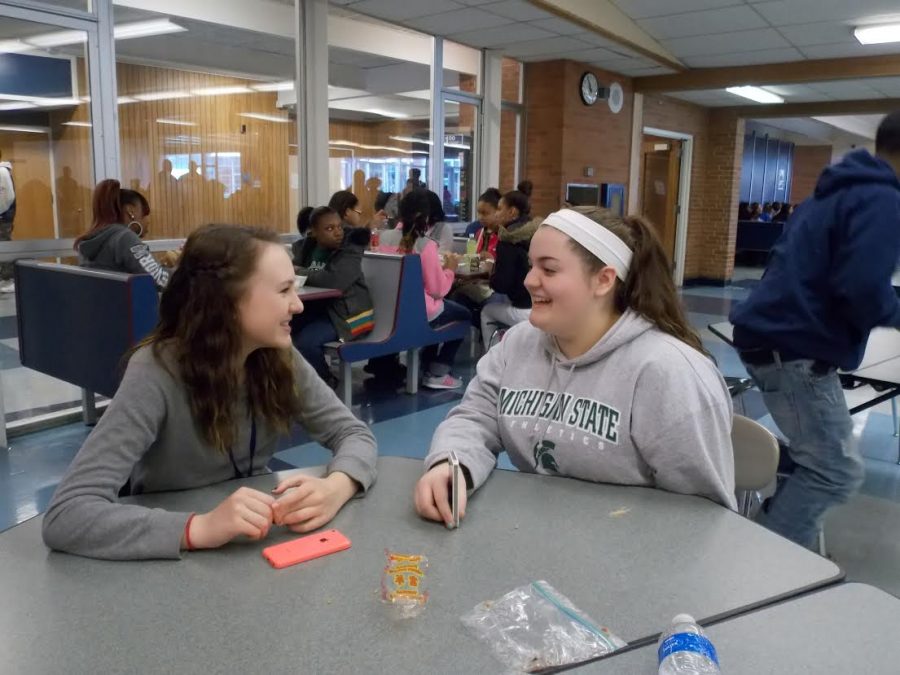 Freshman Rachel Thompson (on the right) talks with her friend Kamryn Chapman (on the left) during lunch. They have been friends for four years.
