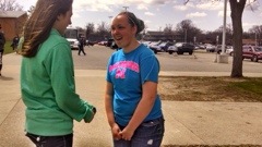 Jasmine Adams talks to her friend Tori Zehner after school. They are both on the JV soccer team.