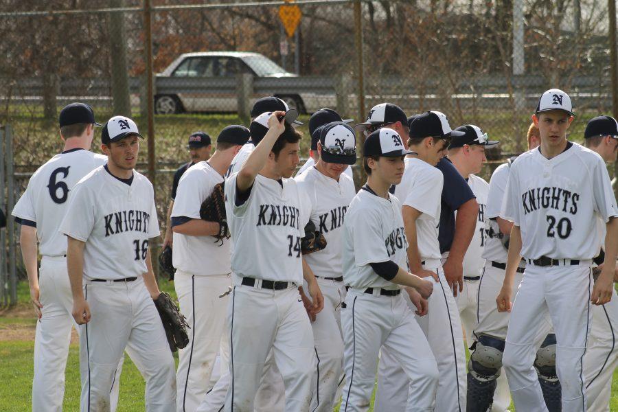 Knights talk over the rough inning. Photo Credit / Claire VanderVeldon