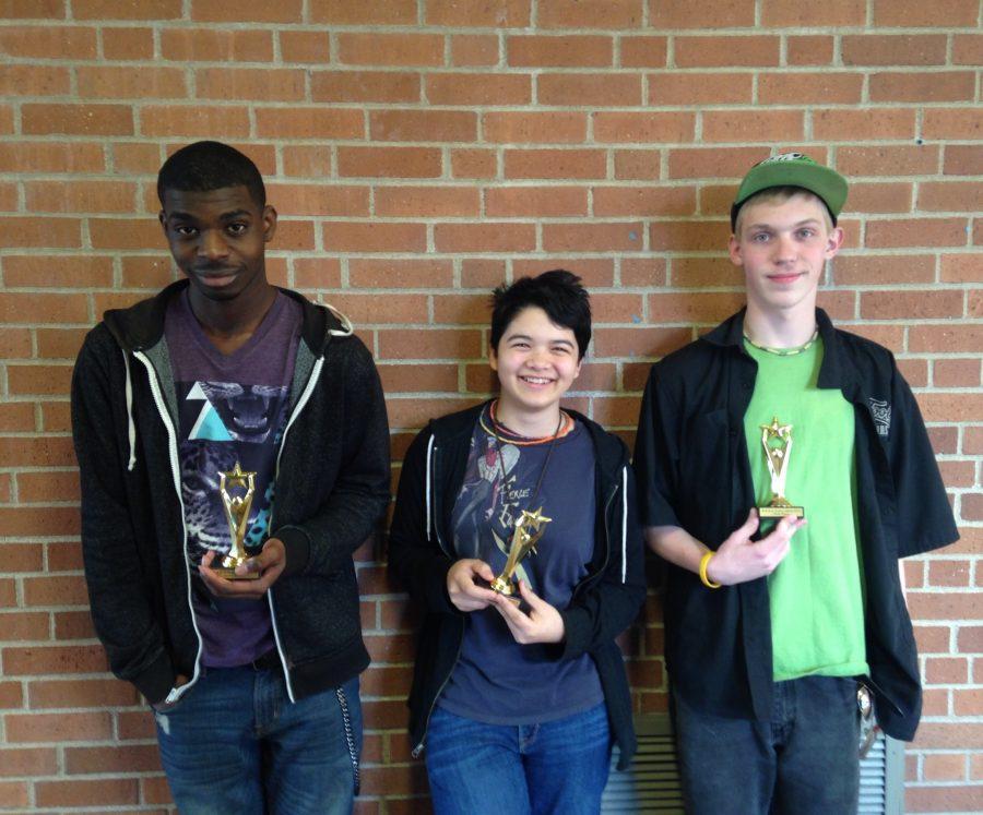 To  the  far  left  is  second  place  winner,  sophomore  Khaleel  Cook.  In  the  middle  is  third  place  winner  Emily  Wigler.  On  the  far  right  is  first  place  winner  Daniel  Coffee. Photo Credit / Taylor Timmerman