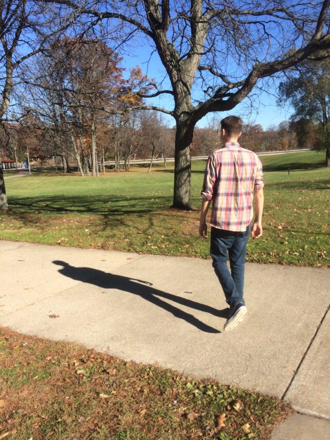 Knight Life staff member Clayton Barker, enjoys the pleasant November air while it lasts. Soon the Michigan cold will strike.