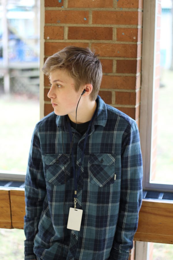 Junior Josh Killingsworth is often seen listening to the 90s rock band in the halls. He listens to Nirvana on a daily basis. Photo Credit / Chris Hybels