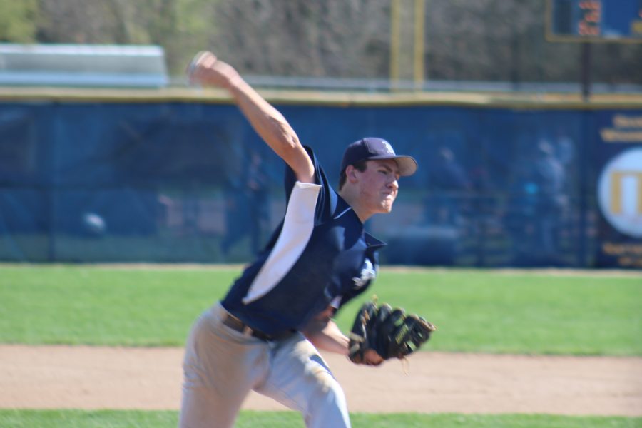 Rob Pincus's junior pitcher, James Rinehart throws in the third inning against Mattawan High School on May 4th. James is one of many pitchers on Loy Norrix Baseball team. Norrix finished the game with a 5-2 loss Photo credit / Jonathan Palone 