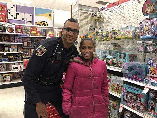 Current and Former Loy Norrix Police Officers Give Back to the Community they Serve for the Holidays