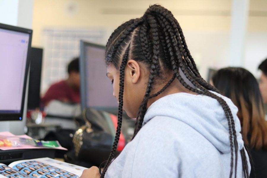 Sophomore Karmani Williams works on editing for the school yearbook. Williams enjoys all forms of creative expression, whether through school or in her free time.