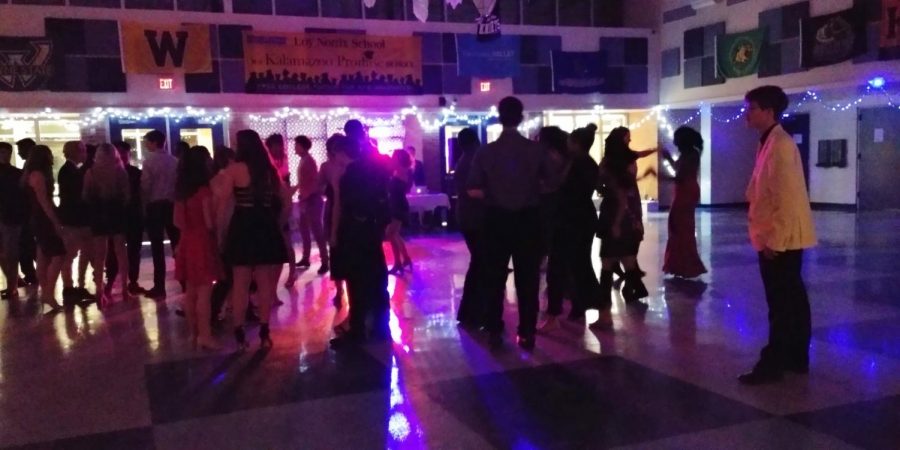 Half an hour after the dance started, students were already mingling. Some attendees stood apart from their peers, hesitant to join the crowd. Photo Credit / Colin Carnell