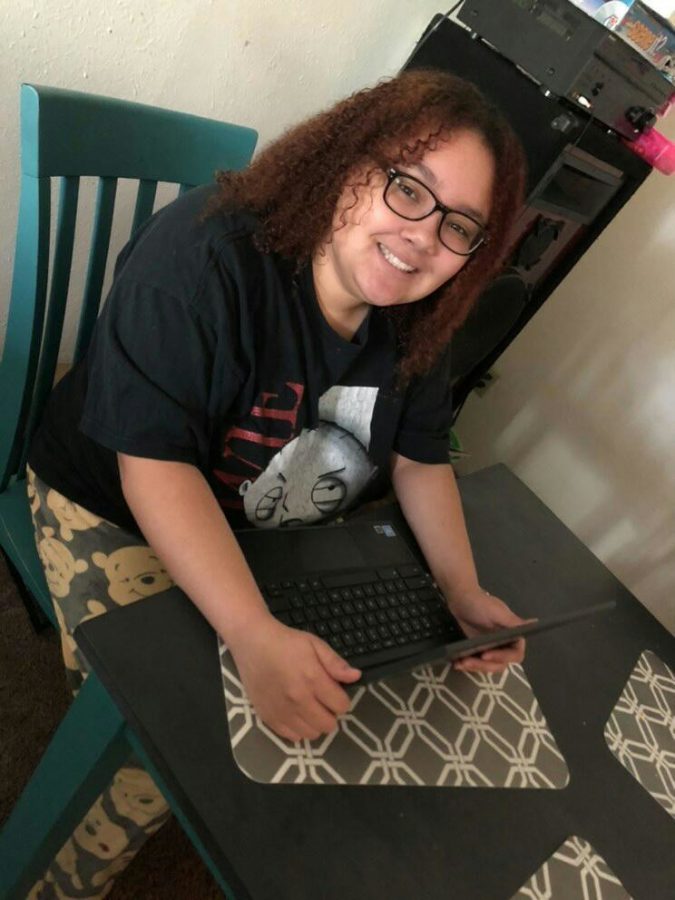 Sophomore Tierra Carson sits at her computer during 4th hour accounting class. Even though its online, shes learning a lot and enjoying the class. 