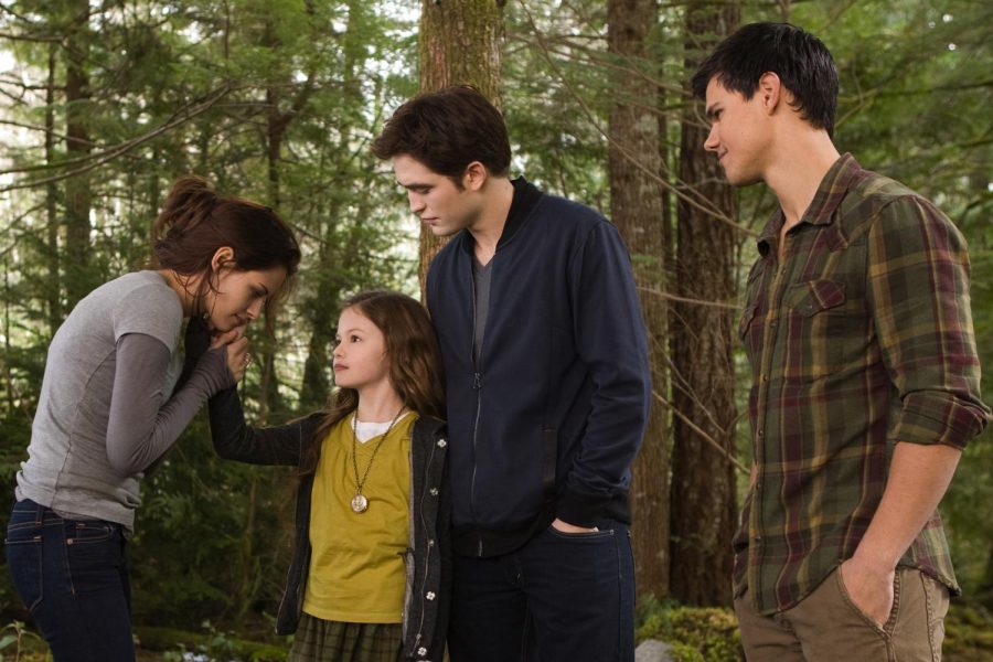 Bella Swan, Renesmee Cullen, Edward Cullen and Jacob Black (left to right) in Twilight: Breaking Dawn Part 2.
