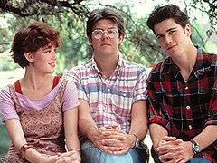 Molly Ringwald, John Hughes, and Michael Schoeffling (left to right). Ringwald and Schoeffling acted as Samantha Baker and Jake Ryan respectively in the film which was directed by Hughes.