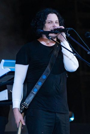 Jack White at Rock Werchter in 2018. Since this concert White has adopted short, blue hair and some vanity to boot.