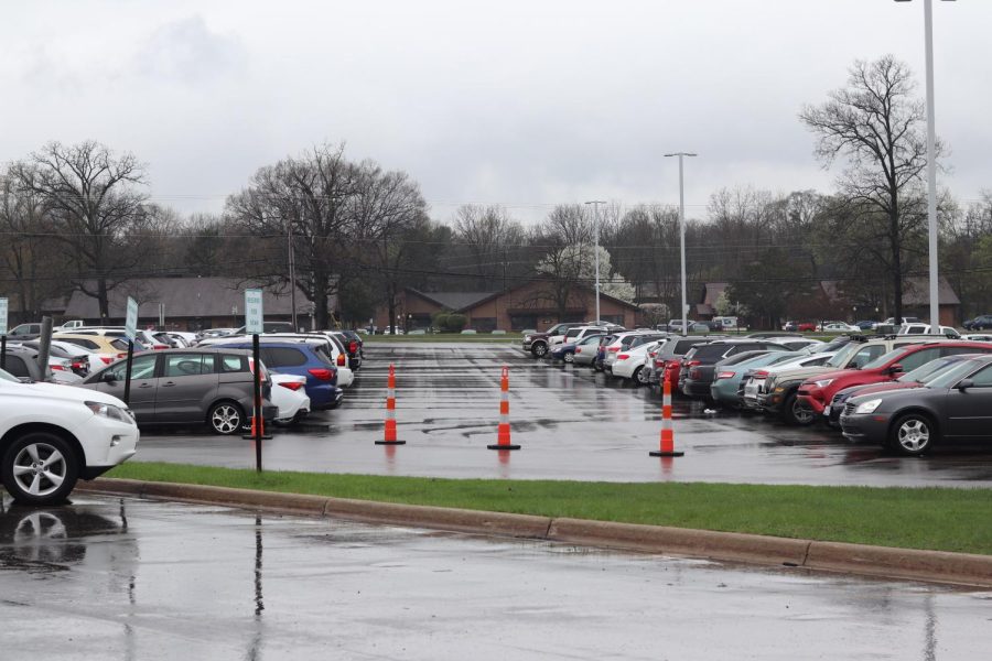 Cones+stand+in+the+LN+parking+lot+to+draw+the+loop+that+parents+take+for+drop+off.+This+prevents+cutting+past+the+line+for+drop+off.
