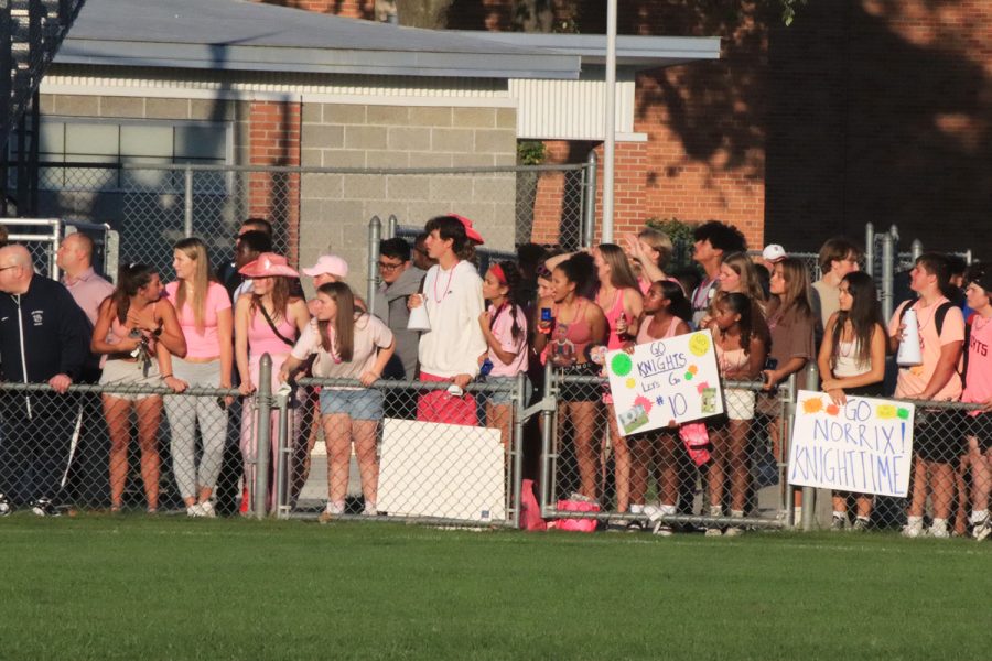 Loy+Norrix+students+gather+and+show+their+support+at+the+Norrix+and+KC+soccer+game%2C+with+a+fun+pink+out+theme.+