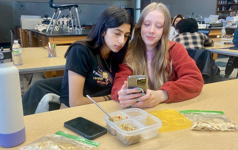 Juniors, Ava Belknap and Sophia DeAnda eating lunch in Daniel Houvener’s room. They eat lunch there everyday as they find the room to be better than eating in the cafeteria.