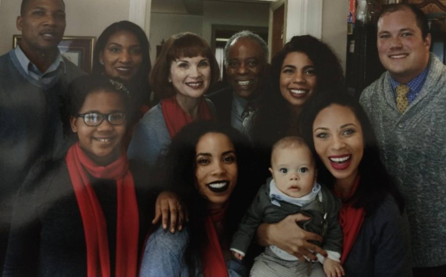 Savannah Robert (left, middle) with her family. Every year, they take a photo with everyone to celebrate being together for the holidays.