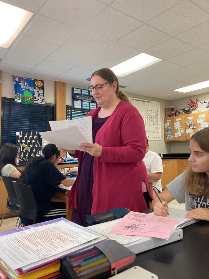 KAMSC biology teacher Colleen Chapoton passes out old tests to her honors biology 9th grade students. They are reviewing their past assessments in preparation for final exams coming up in a week. 
