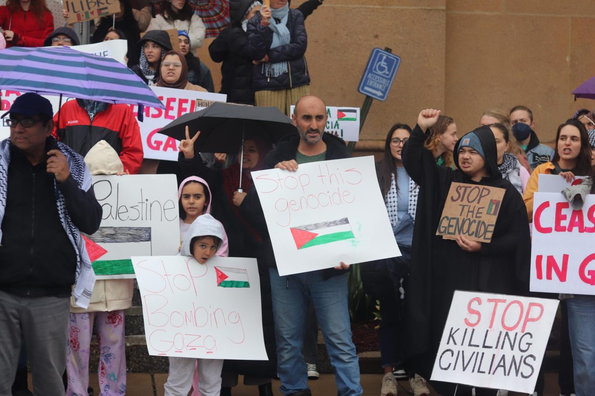 Many Muslim families came to the protest in front of the Federal Building on Oct. 19. They held signs urging the Israeli government to stop bombing the Gaza Strip. 