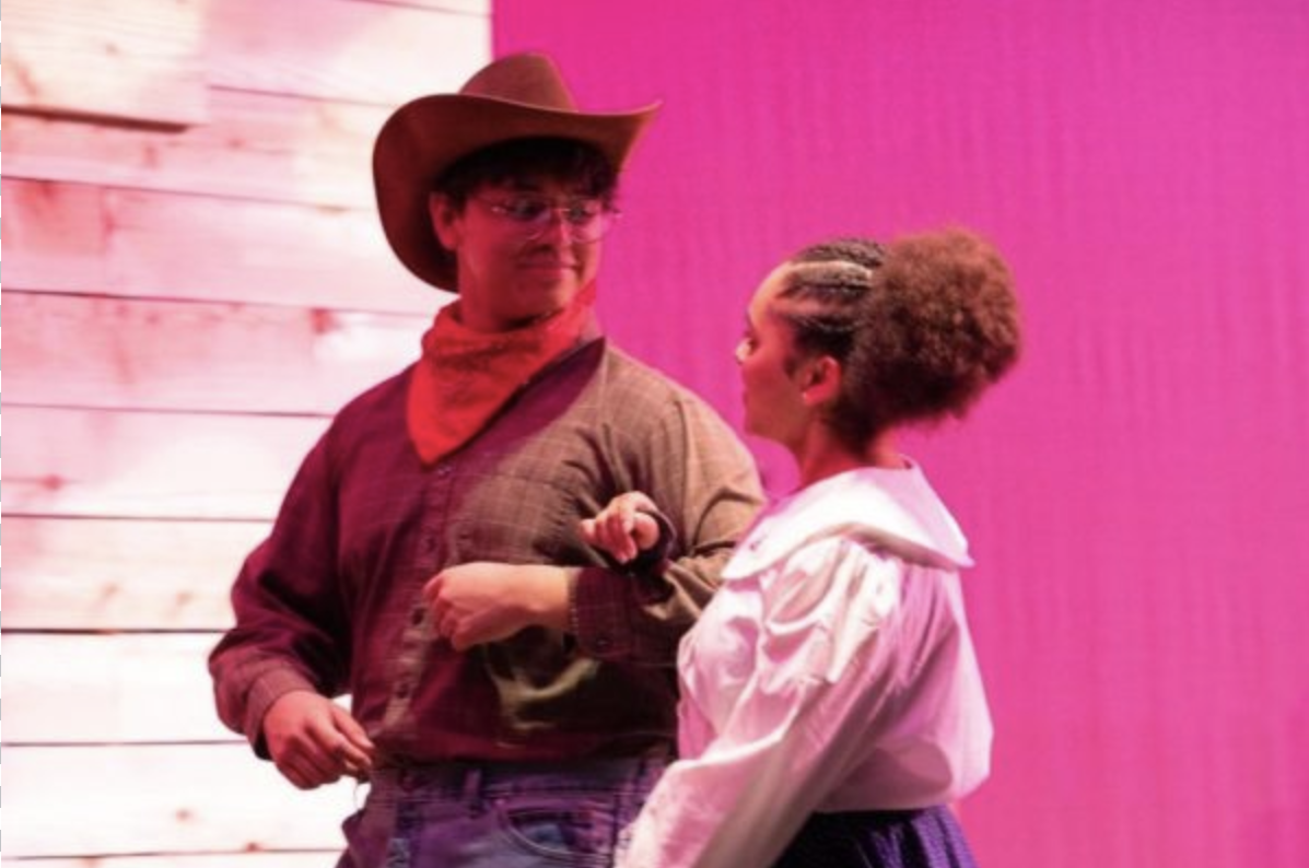 Obed Gonzalez Aguilar and Gracie Harris step on stage during their performance of Oklahoma. As they were stepping on stage, Obed was trying to keep a straight face while walking to the song “People Will Say We’re in Love.”