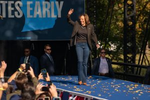 Warmly greeted by supporters, Vice President Kamala Harris walks out to the podium at her rally in Grand Rapids. Harris encouraged voters to vote early, emphazizing the imporance of swing states such as Michigan.