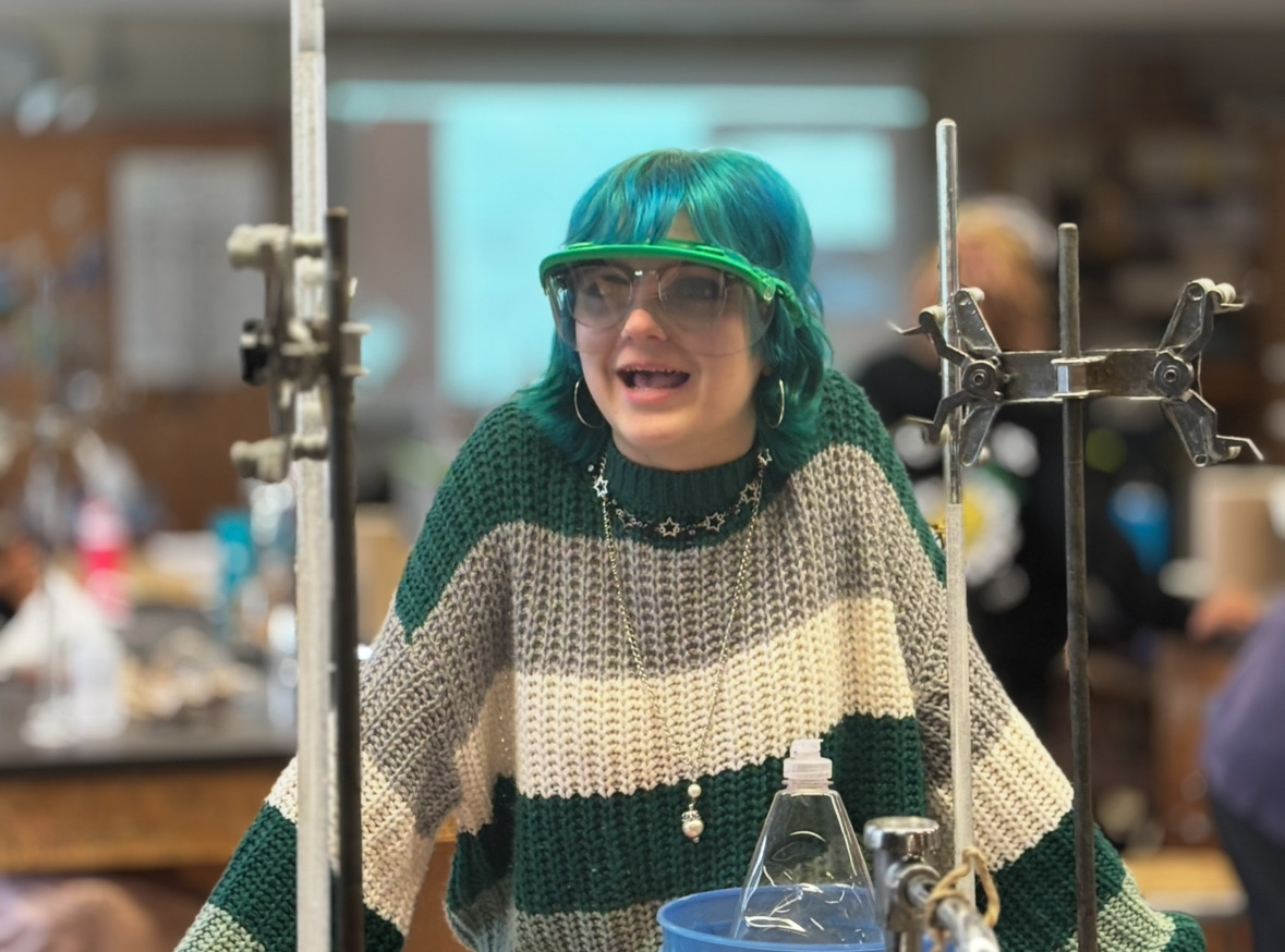 Junior Charlie Patton laughs with his friends while working on a lab in their chemistry class. Patton is a well known individual amongst many transgender students. 