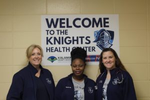 Students at the Knights Health Center receive care from three medical professionals: Catherine Wall Emerson, the clinical social worker, Eureka Jennings, the medical assistant, and Kelly Brizendine, the physician's assistant.