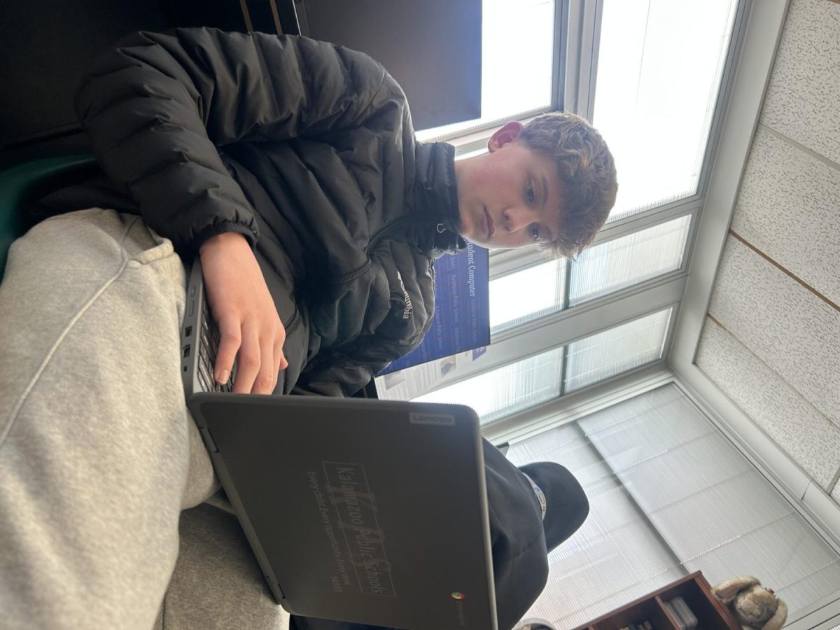 Freshman Brady Charles is working on his project during Tisha Pankop’s fourth hour journalism class on Monday. He is focused on typing out his story for the assignment.