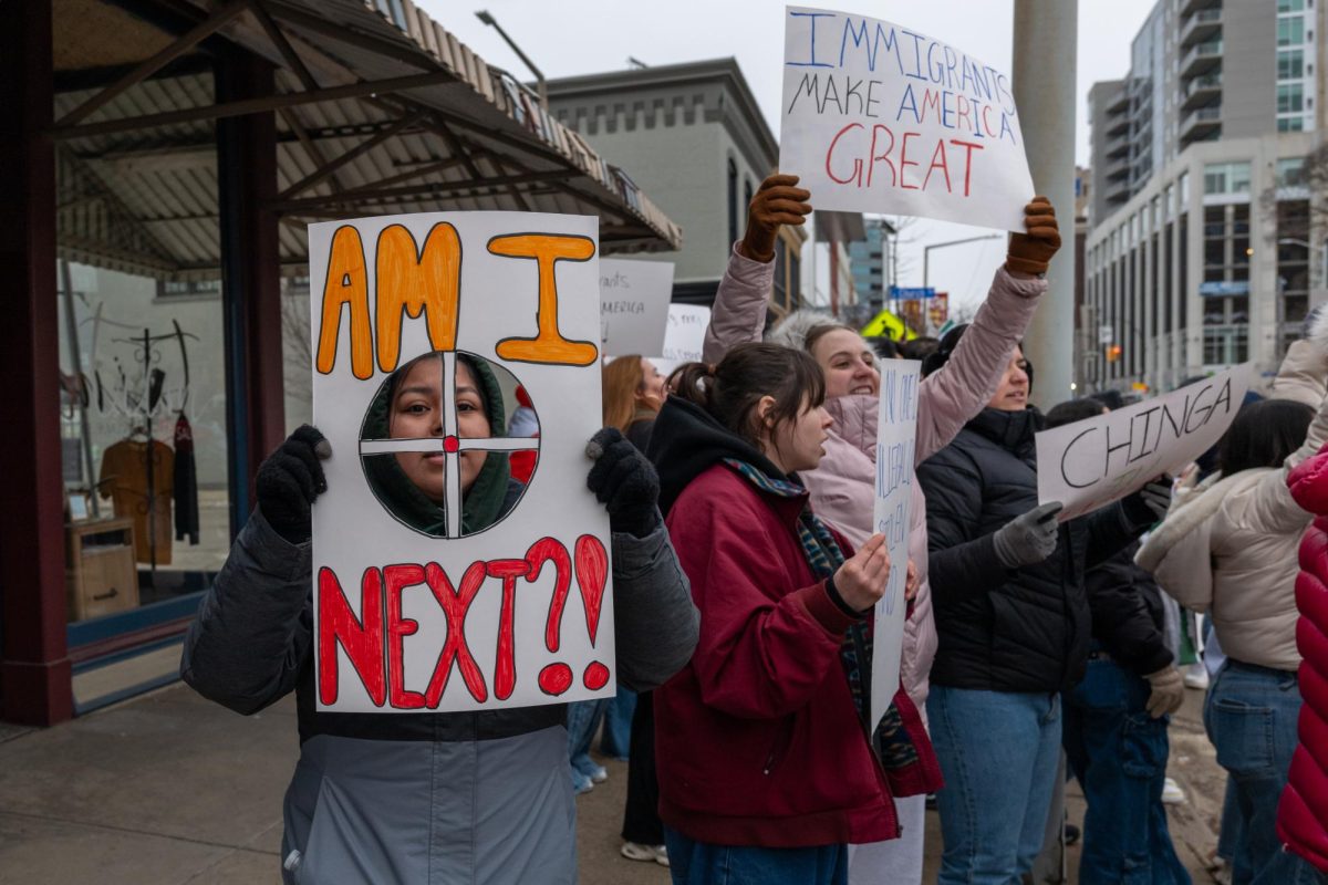 Protesters gather downtown to oppose President Trump’s immigration policies