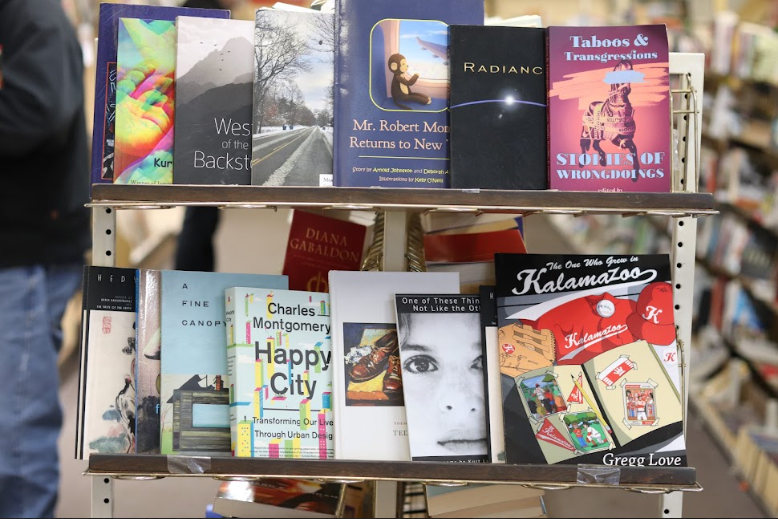 Popular books are displayed at Michigan News Agency's final sale.