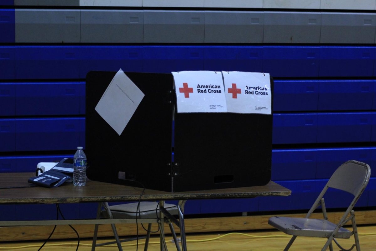 At the registration and health screening desk, Red Cross volunteers meet with donors to make sure they are in the right physical conditions to give blood.