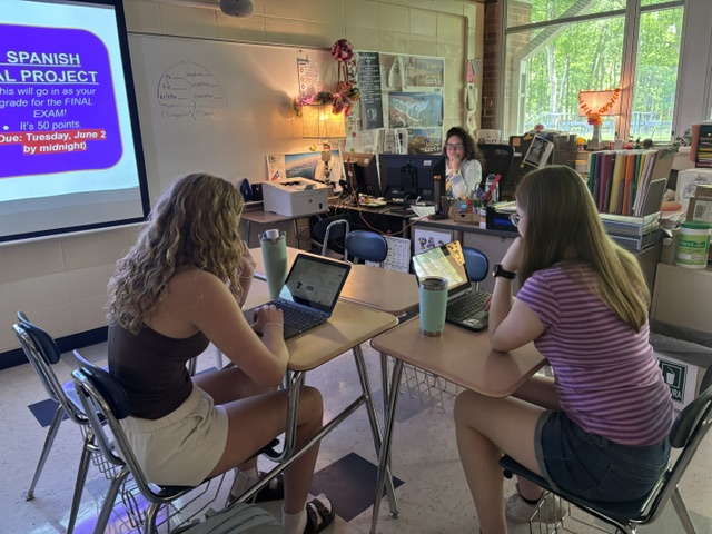 Sophomore Matilda Dunfee and Junior Madeline Hunt work hard in their AP Spanish class with Ms. Grabowski.